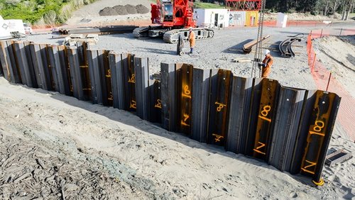 Embedded retaining wall